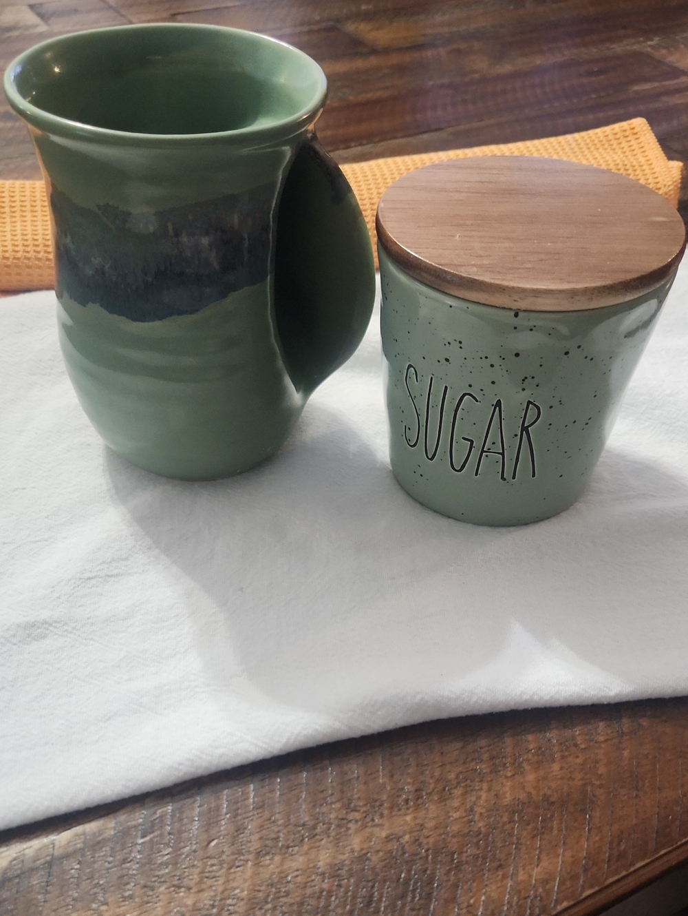 Neher mug and a sugar canister